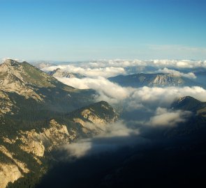 Morning in the mountains - clouds over Peručica forest