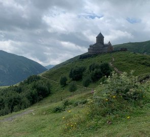 Gergeti Church and surrounding mountains