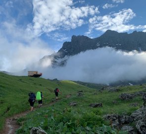 We come to a big surprise on the way - the building of a mountain hut, which is under construction